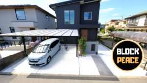 カーポートフーゴと大判タイルのアプローチがモダンな一条工務店の新築外構施工例全景