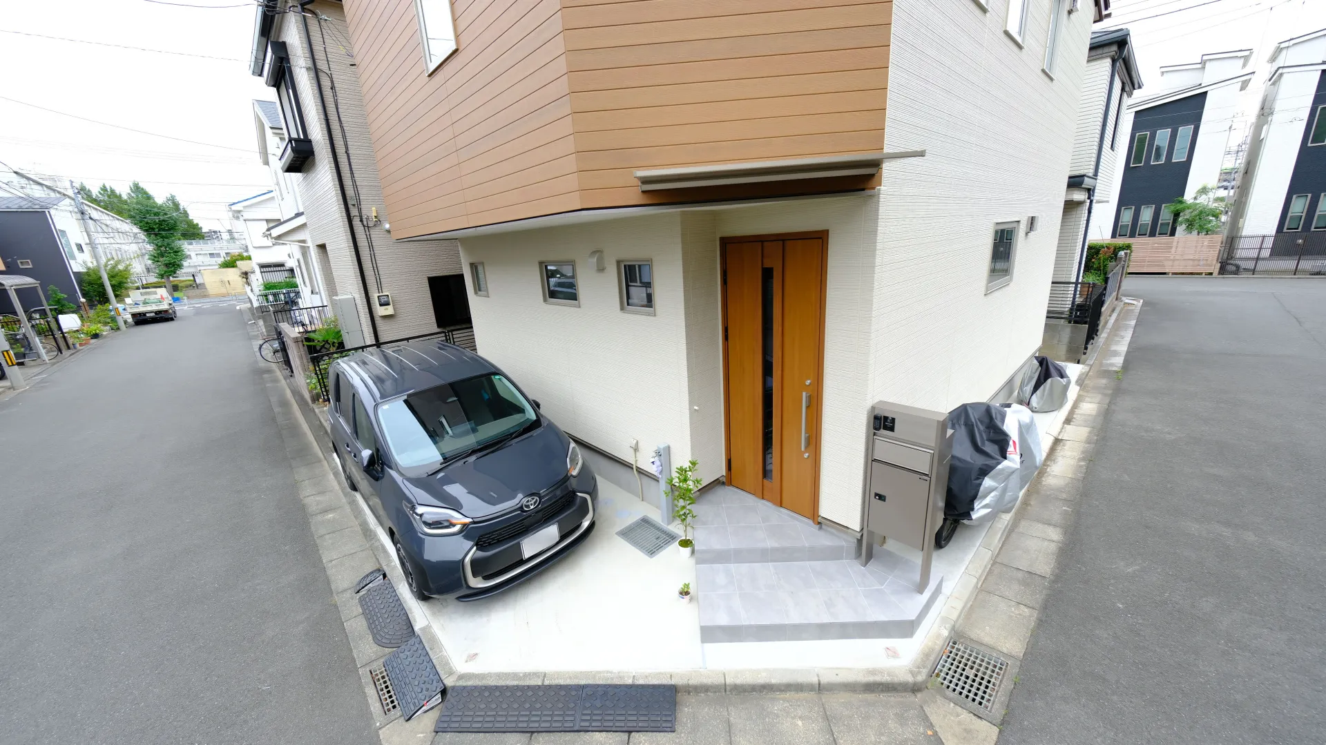 隅切りのある角地に施工した新築外構の完成写真